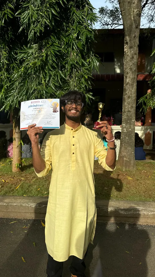 Suhas with the semi-classical trophy and certificate